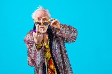 Cool senior man with fashionable outfit portrait - Funny old male person with cool and playful...