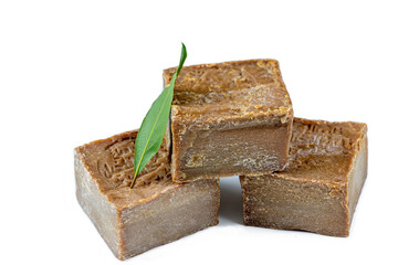 Close up of a trio of layered dalep soaps.