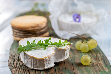 Close-up of Neufchâtel (Normandy cheese) with cheeses.