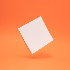Square invitation paper card mockup on orange background. Minimalism.