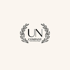 Obraz premium UN Beauty vector initial logo art handwriting logo of initial signature, wedding, fashion, jewelry, boutique, floral