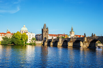 Old town with Charles Bridge with bridge tower on Vltava river in Prague, Czech Republic