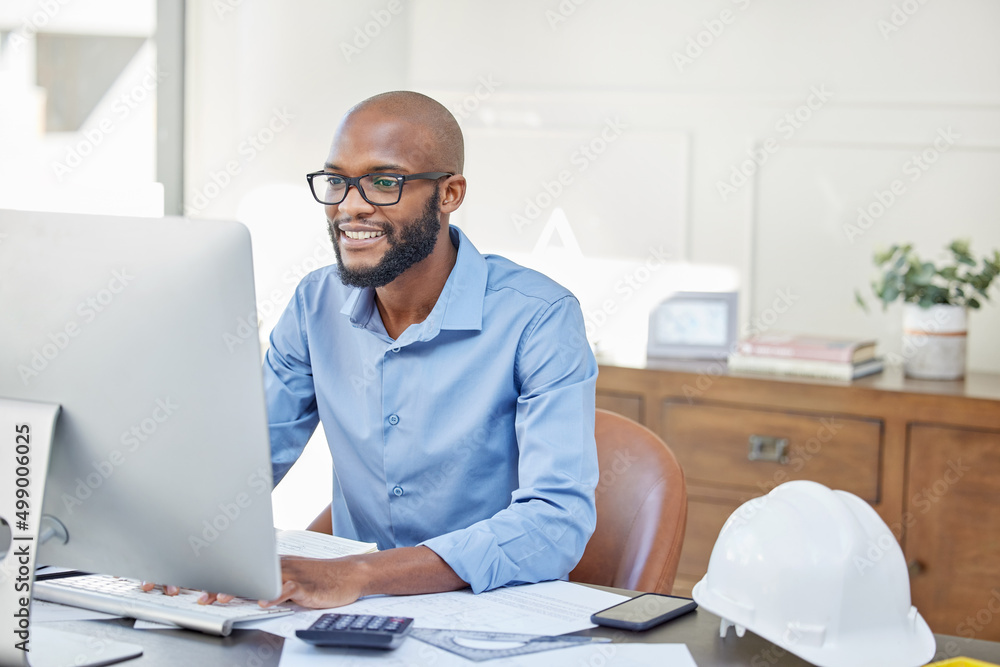 Poster If your inbox is full of satisfied clients, youre doing good. Shot of a businessman using his computer while sitting at his desk.