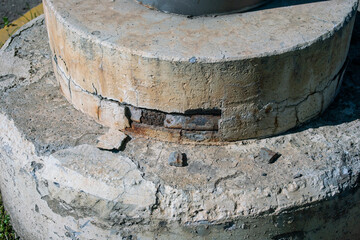 Reinforced concrete with deterioration of the structures at the base of a pillar, due to corrosion...