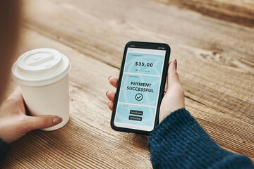 Woman paying with smartphone for online shopping. Paying using fast secure payment system. Woman...