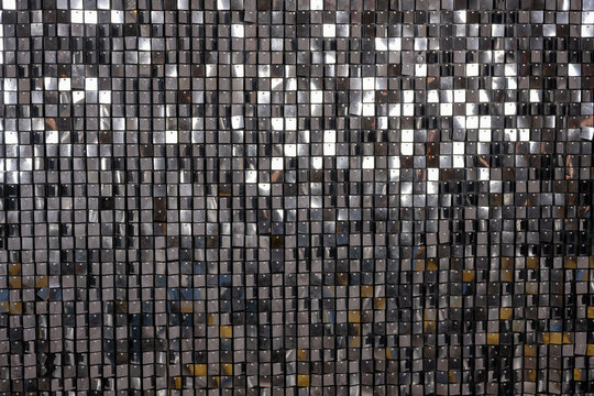 Silver background with square texture.