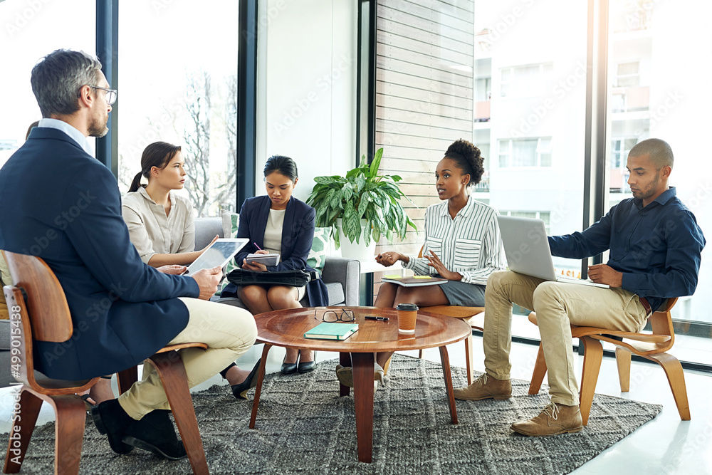 Aufkleber shes bringing some new ideas to the table. shot of a group of work colleagues talking together in a 