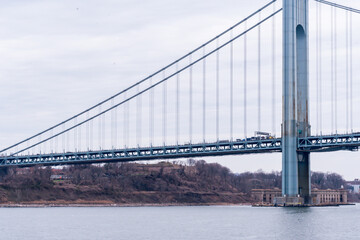 Fototapeta na wymiar The Verrazano Narrows Bridge connecting Staten Island to Brooklyn as seen from New York Harbor. 