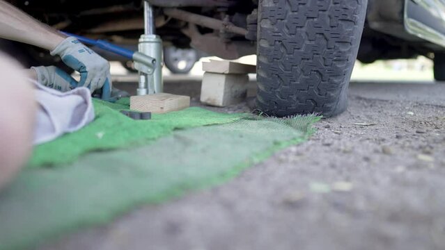 Man Changes Tire - Slow Motion