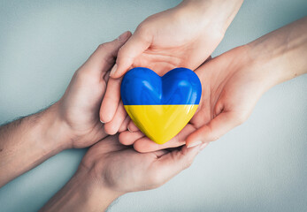 The concept of charity, love, donate and helping hand Ukraine.