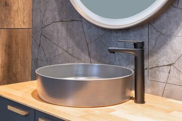 Bathroom interior with sink and faucet.