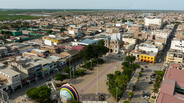 Aerial shot of the main park, church and city of Tumbes, Peru