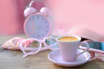 womens stylish accessories, smartphone with blank screen, glamorous set in pink shades, flat lay, copy background, womens clothing, alarm clock, lipstick, coffee cup, good morning concept, female life