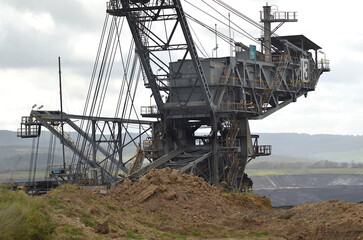 Fototapeta na wymiar Dredge maintenance-replacing bucket wheel on site Yallourn opencut coal mine