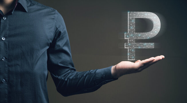 ruble icon from web and dots. man holding in his hand