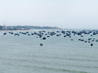 there are a lot of fishing boats in the sea