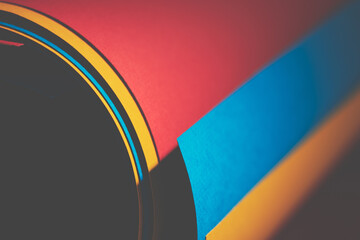 Multi-colored paper rolled up close-up