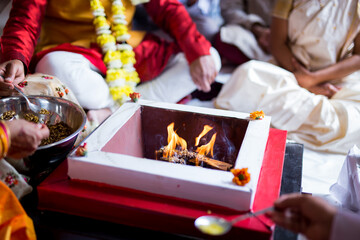 Indian Hindu wedding ceremony sacred fire close up