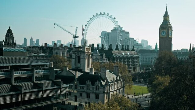 Aerial Spring panoramic view of Big Ben, Parliament Square and London traffic. Scenic view of the city of Westminster with tourists on a sunny day.