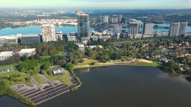 Aerial drone view of Rhodes, an Inner West suburb of Sydney looking over McIlwaine Park and Brays Bay along Parramatta River 