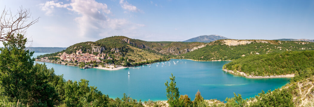 The city on the bank of the artificial lake in France, Provence, lake Saint Cross, gorge Verdone, azure water of the lake and slopes of mountains on a background, small boats, vacations place © Vladimir Drozdin