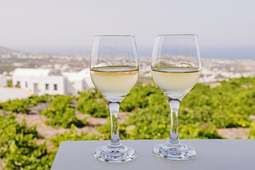 Two glasses of cold white wine close-up