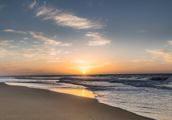 Deserted Hawaiian beach sunset in Kauai 