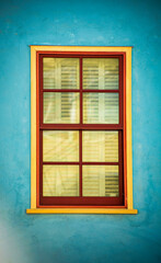 modern window with red and yellow trim
