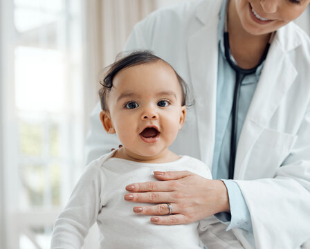 Regular checkups are essential to ensure baby stays healthy. Shot of a paediatrician examining a baby in a clinic.