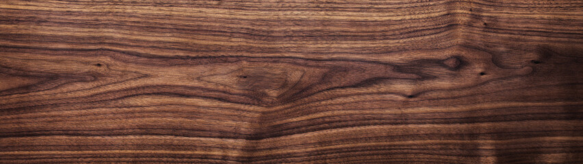 Dark tone wood plank texture background. Black walnut long plank texture. Wooden plank texture element.