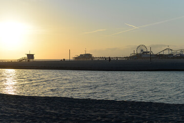 Santa Monica, California, USA - April 10, 2022: View to Santa Monica Pier during the sunset