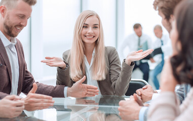 young businesswoman explaining new tasks at a working meeting.
