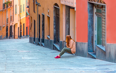 The high narrow house and Genoa is a historical port of city in northern italy