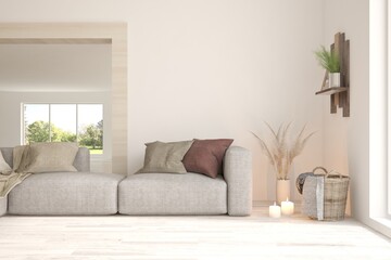 White living room with sofa and summer landscape in window. Scandinavian interior design. 3D illustration