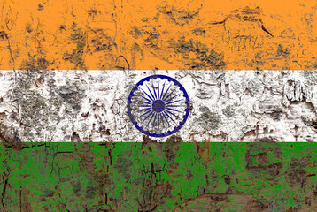 Fototapeta na wymiar National flag of India painted on the surface of rough textured bark