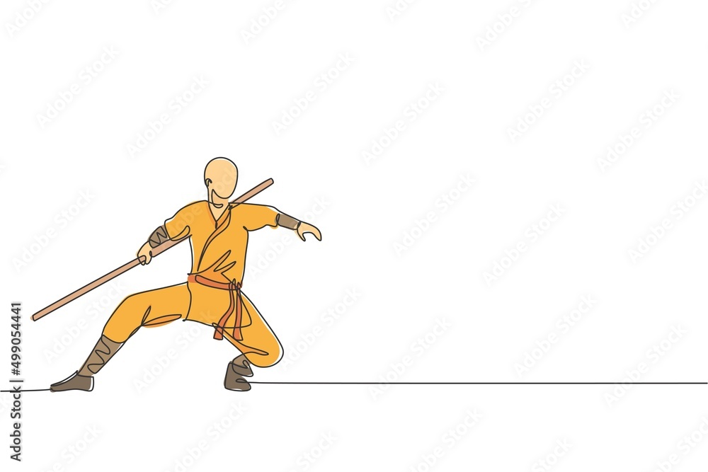 Poster one continuous line drawing of young shaolin monk man practice kung fu with stick at temple ground. 