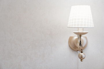Beautiful classic sconces with a lampshade for a classic retro interior.
