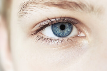 Blue eye Macro. Children's eye close-up