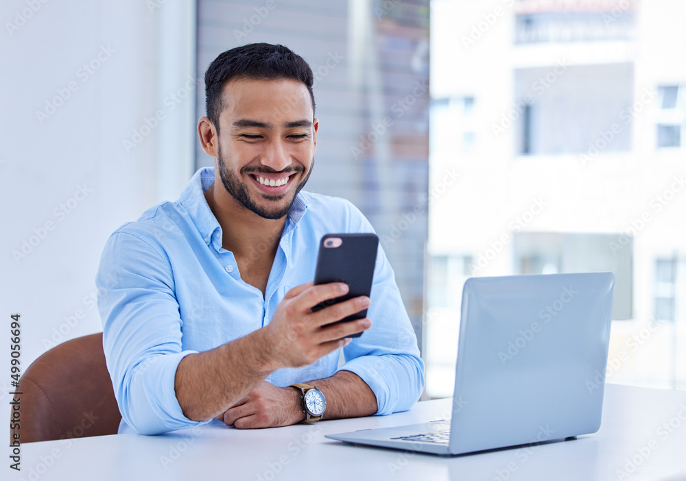 Poster romantic texts always make my day. shot of a businessman using his smartphone to send a text at work