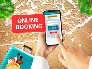 Hand using smartphone to booking hotel online on beach summer.