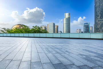 Fototapeta premium Empty square floor and city skyline with modern commercial buildings in Hangzhou, China.