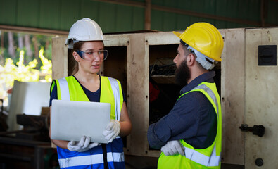 A team of professional male and female engineers with quality skills, inspecting, controlling, and maintaining machines