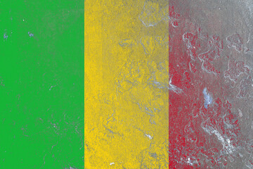 Rustic flag of mali painted on a damaged old concrete wall surface