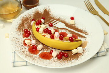 Concept of tasty dessert with banana, close up