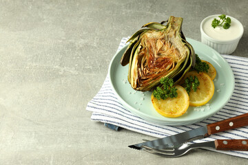 Concept of tasty food with grilled artichoke, space for text