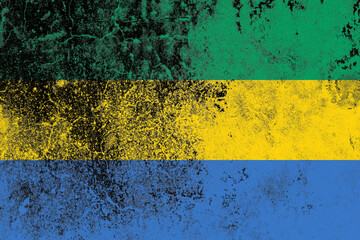 Gabon flag on a grungy old concrete wall surface
