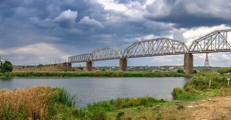 Dark rain clouds over the Southern Bug river