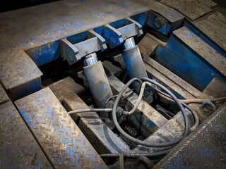 A hydraulic platform for lift cargo truck. Routine maintenance and repair of the cars