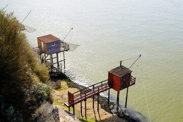 Fishing huts wooden with nets in Meschers-sur-Gironde top aerial view
