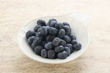 Sweet ripe blueberry heap in the bowl